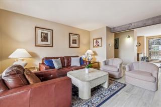 Riverside Condo, with a Pool & Hot Tub - Steps to Town - 6
