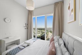 Modern 1BR at Golf Vita A in Damac Hills Near Golf - 8