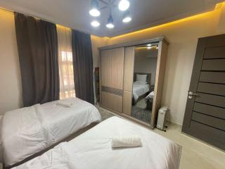 Stylish 1BR Madinaty Garden View - Madinaty - 9
