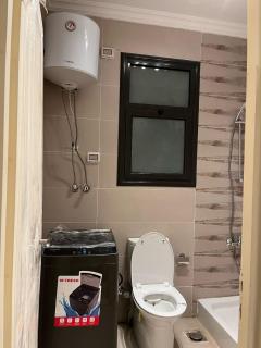 Modern Studio 1BR, Celia TMG, New Administrative, New Capital, Fully Equipped, King Bed, Ground Floor - Kafr ash Sharā‘inah - 6