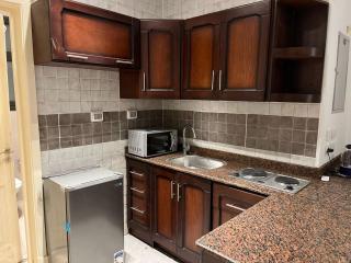 Modern Studio 1BR, Celia TMG, New Administrative, New Capital, Fully Equipped, King Bed, Ground Floor - Kafr ash Sharā‘inah - 4
