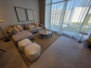 Sleek 1BR Haven Comfort and Style in Pearlhouse! - Manama - 9