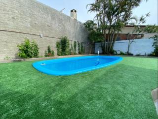 Casa com piscina na praia - Tramandaí - 8