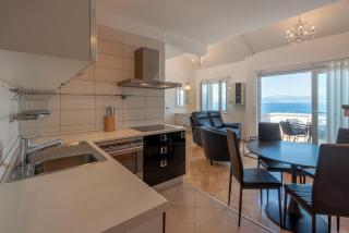 APARTMENTS BRUNO 1&2 - two-room penthouse apartments - wonderful panoramic view of the sea - the best location, first row to the beach - 10 minutes from Supetar ferry port - free secured parking - facilities nearby - 8