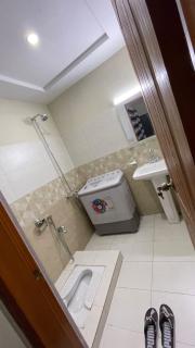2-Bedroom Fully Furnished Family Apartment with 1 Air conditioned bedroom, full kitchen, lounge, sitting area, attached baths, patio, washer, dryer Near market, mall & Express highway - Rawalpindi - 6
