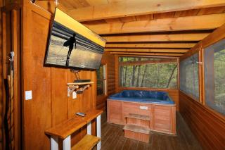 Screened in porch with hot tub and TV! - Sevierville - 1