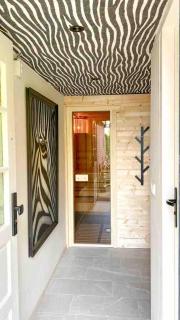 Ubuntu Luxe Vakantiewoning met Sauna & Nieuw Design - Warmenhuizen - 4