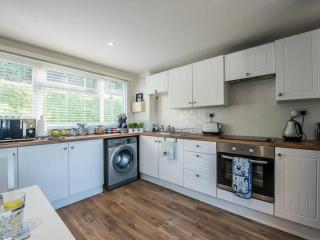 Charming Beach Chalet with Balcony & Sea Views - 2