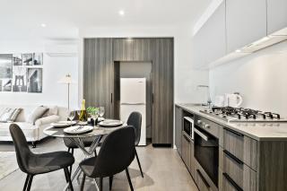 High-Rise 2BR Luxury Apartment NYC-Inspired Design with Pool Gym Parking and Waterfront Views - 6