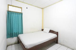 SPOT ON 92529 Penginapan Wisma Bintang Syariah Near MTs Al Ma'arif Kota Bangun - - 0