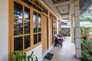 OYO 92572 Mountain View Homestay - Manado - 4