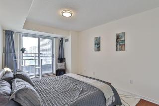 Cozy 1BR Condo with Balcony and Parking - 2