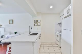 Cozy 1BR Condo with Balcony and Parking - 1