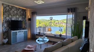 Seeblick-Ferienwohnung im "Ferienhaus Agger-Blick" mit traumhafter Sonnen-Terrasse, Sauna, E-Kamin & Kajak - 1