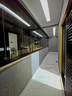 Casa Encantadora com piscina quentinha, lazer completo e do lado da praia - Praia Grande - 9