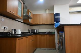 Luxurious 1BHK Apartment in Gurgaon with Shared Pool and BBQ Area - Gurgaon - 9