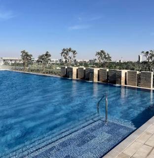 Homesgetaway - Elegant 2BRApt In Navitas A Damac Hills 2 - Dubai - 9