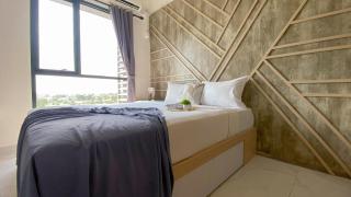 Homey and Clean Studio at Sky House Alam Sutera Apartment By Travelio - 0