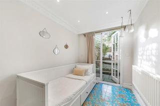 Elegant 6 Bed Home with Garden & Balcony By Harrods - Londra - 3