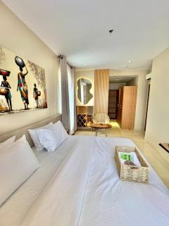 Cozy Waterfront 2BR with Pool & Warm Wood Accents - 9