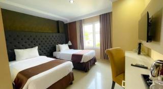 Rizen Premiere Hotel - Puncak - 1