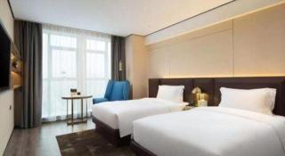 Echarm Plus Hotel Wuhan Wenhua Boulevard Dahualing Subway Statiom - Wuhan - 3