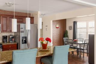 Newark Gem Ruby 3BR, 3BA - Sleeps 12 - Walk to Prudential Center and Newark Penn Station, Near EWR and American Dream Mall, includes Parking - WiFi - Laundry - Backyard - Gym - Newark - 3
