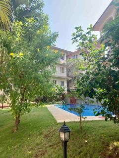 2 bedroom apartment with forest view, pool and gym in North Goa - 2