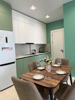 Двухкомнатная квартира с дизайнерским интерьером и видом на горы - 7