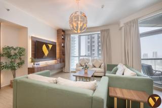 Vogue Vacation Homes, Marina Torch Tower near JBR Beach and Dubai Marina Mall, Two Bedroom Apartment with Balcony and City Skyline View, Access to all Amenities - 9