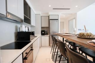 Beachfront 1BR with Marina & City Views - 5