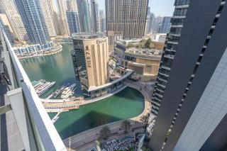 Free housekeeping visits during your stay - StayShort - Contemporary 2-Bedroom Apartment in Silverene - Dubai - 0