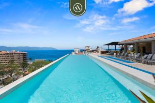 Elegant 2 BR Condo with Amazing Rooftop Pool - 1