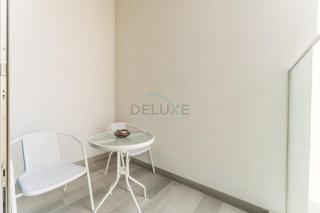 Pool and Community View Studio,Just Steps Away from the Mall, Concept 7 Residences, Jumeirah Village Circle by Deluxe Holiday Homes - 4