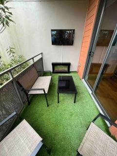 The Red Room - Cloud Ceilings - Patio & Bathroom TV - Atlanta - 3