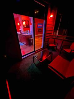 The Red Room - Cloud Ceilings - Patio & Bathroom TV - Atlanta - 2
