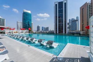 VOGUE MAG318 Business Bay - Downtown Dubai - walkable to Burj Khalifa and The Dubai Mall and Pool View with balcony - Sabkhah - 5