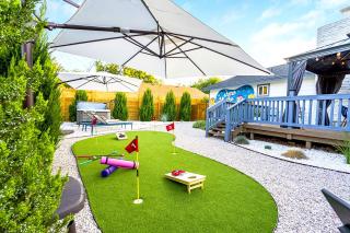 Modern 3BR Retreat with Fun Yard, Mini-Golf, Hot Tub & BBQ Dining Deck - 9