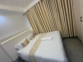 Pamoja stays - Modern studio near transit with balcony and workspace - 0