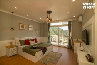 StayVista at The Theog Altair with Bonfire, Wifi, Valley View having 7BR 4BR & 3BR in Theog - 7