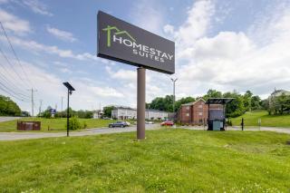 HomeStay Suites - 0
