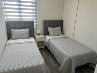 DEPARTAMANTO NUEVO EN CHILLÁN, ESTACIONAMIENTO Y AIRE ACONDICIONADO a - 4