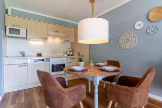 Ferienhaus Süderpiep – 4 individuelle Ferienwohnungen nahe Südstrand Ferienwohnung Robbe – stilvolle EG-Wohnung mit Terrasse in Strandnähe - Sankt Peter-Ording - 1