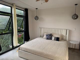 Dormitorio con baño privado es Tu descanso en el corazón de San Salvador - San Salvador - 1