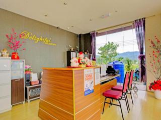 OYO 90597 Delightful Holiday Inn - 9