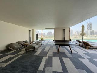 Stylish Studio in JVC with Pool, Gym, Balcony & Modern Comforts - 3