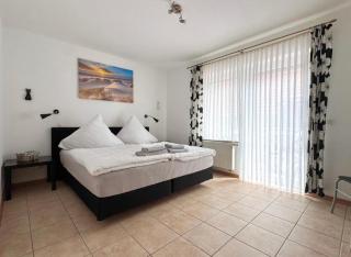 Ferienwohnung Muschel 1 mit Terrasse und Garten, Bensersiel - Holtgast - 4