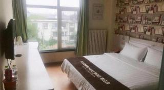 7 Days Inn Qingdao Haier Zone Ditie Tower Jiushui West Road - Qingdao - 1