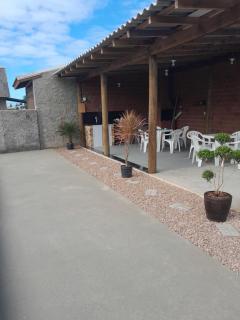 Casa com piscina na praia Itapeva, Torres - 7