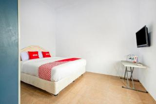 OYO 1906 Zhafira Guest House Syariah - Makassar - 3
